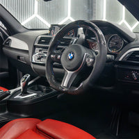 VOLANT PERSONNALISÉ À FOND PLAT BMW FXX EN FIBRE DE CARBONE / CUIR / LED