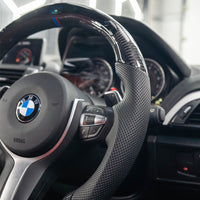 VOLANT PERSONNALISÉ À FOND PLAT BMW FXX EN FIBRE DE CARBONE / CUIR / LED