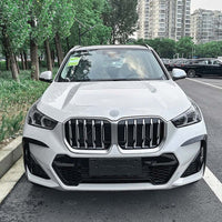 BMW U11 X1/iX1 2022+ GLOSS BLACK FRONT BUMPER TRIM